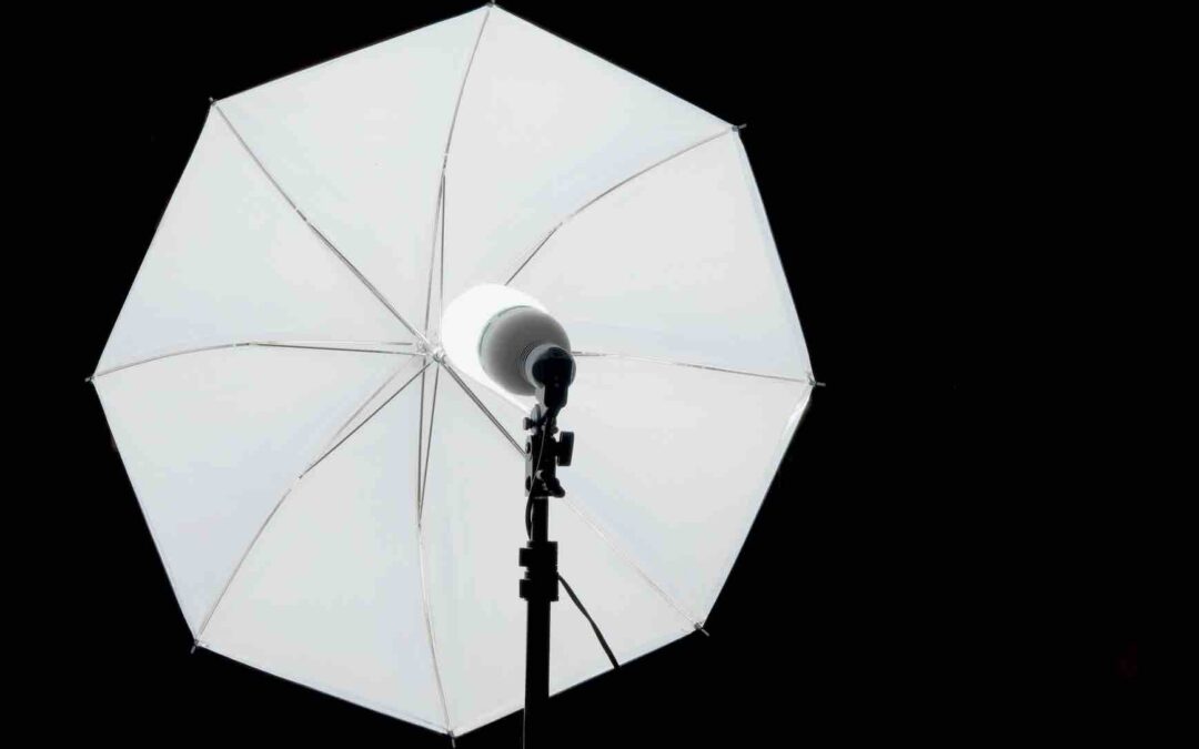 Why do photographers use umbrellas?